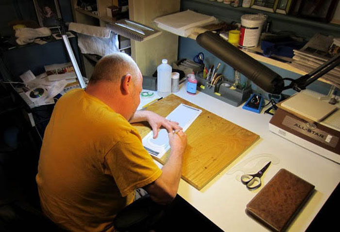 Eryc Courmac working at the glass bench